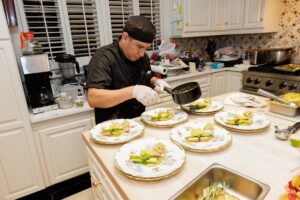 chef preparing plates of food