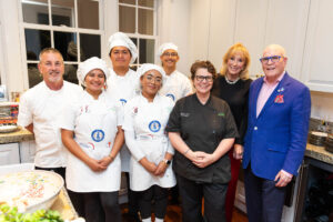 Chef Michael Kuckelman pictured with Lake-Worth High-School Culinary-Students and Chef Emmanuelle Suarez and Susan and Bob Wright