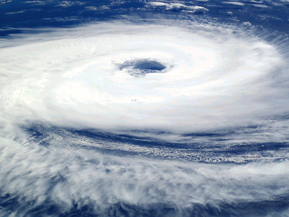 swirling hurricane over water